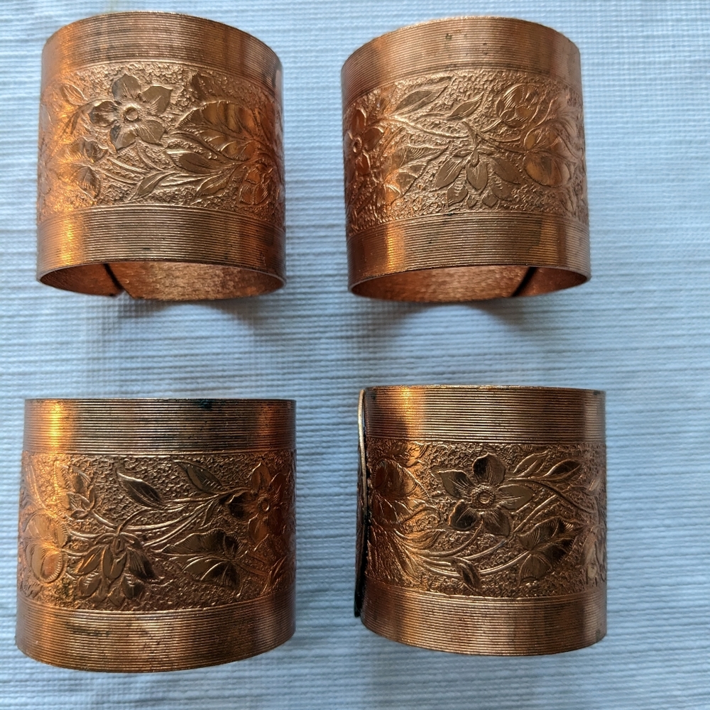 Coppercraft Guild boxed set of four napkin rings vintage copper floral